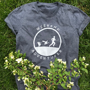 This navy t-shirt has a white silhouette of a male golfer being chased by two Canadian geese.