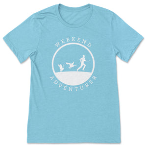 This aqua blue t-shirt has a white silhouette of a male golfer being chased by two Canadian geese.  